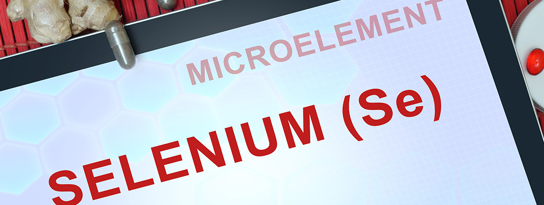 A tablet displays "MICROELEMENT SELENIUM (Se)" in red text, surrounded by ginger roots and two different pills.